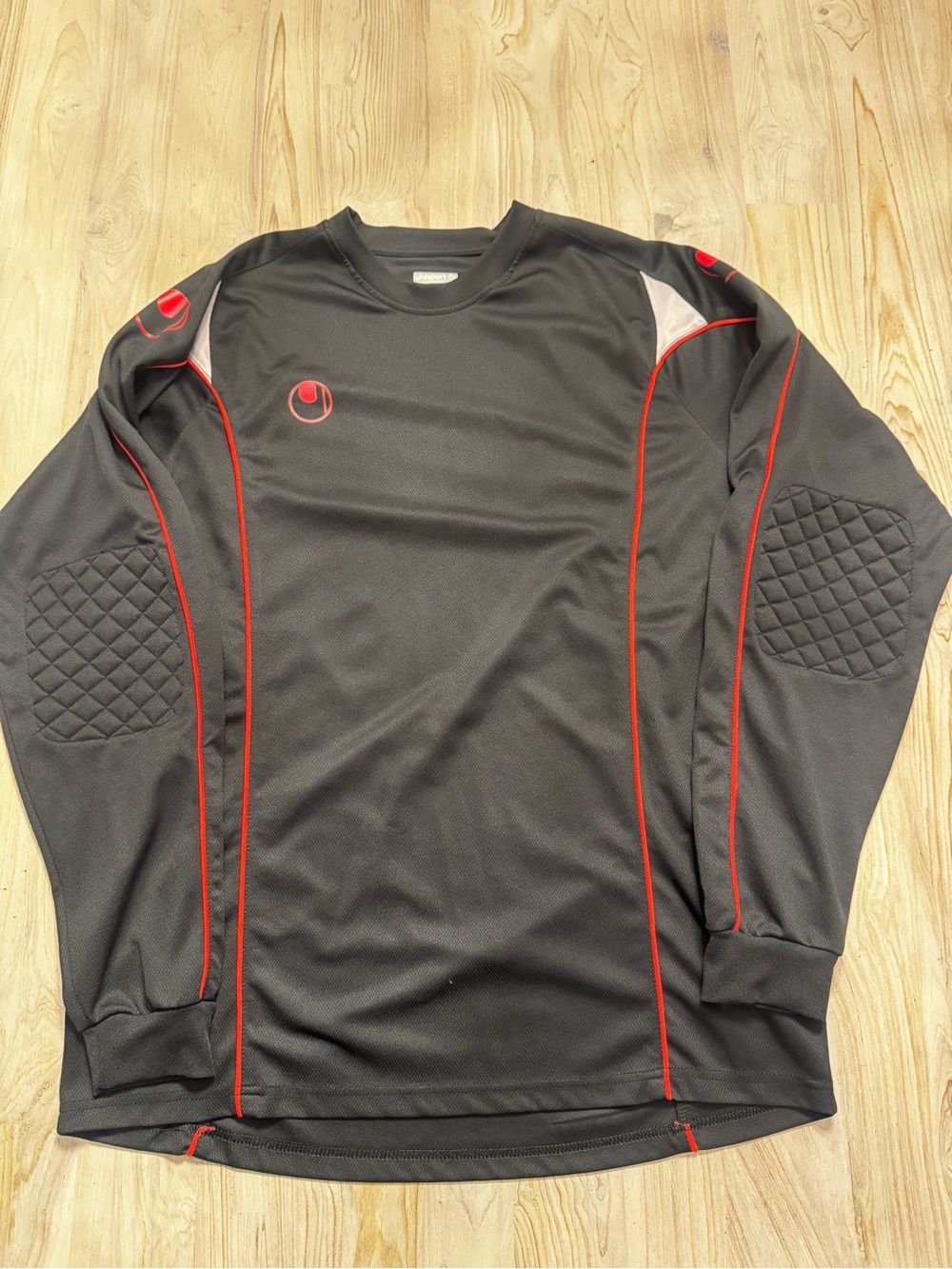 Uhlsport padded Men's Black Soccer Long-Sleeve Athletic Top with Red Trim